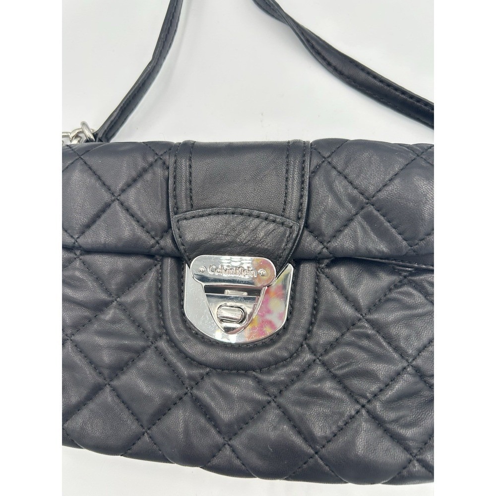 Stunning! Trendy Calvin Klein Women's quilted black leather crossbody bag.